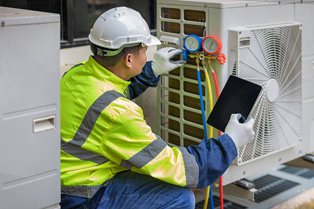 Professional Air Duct Cleaning technician working in North Reading, MA